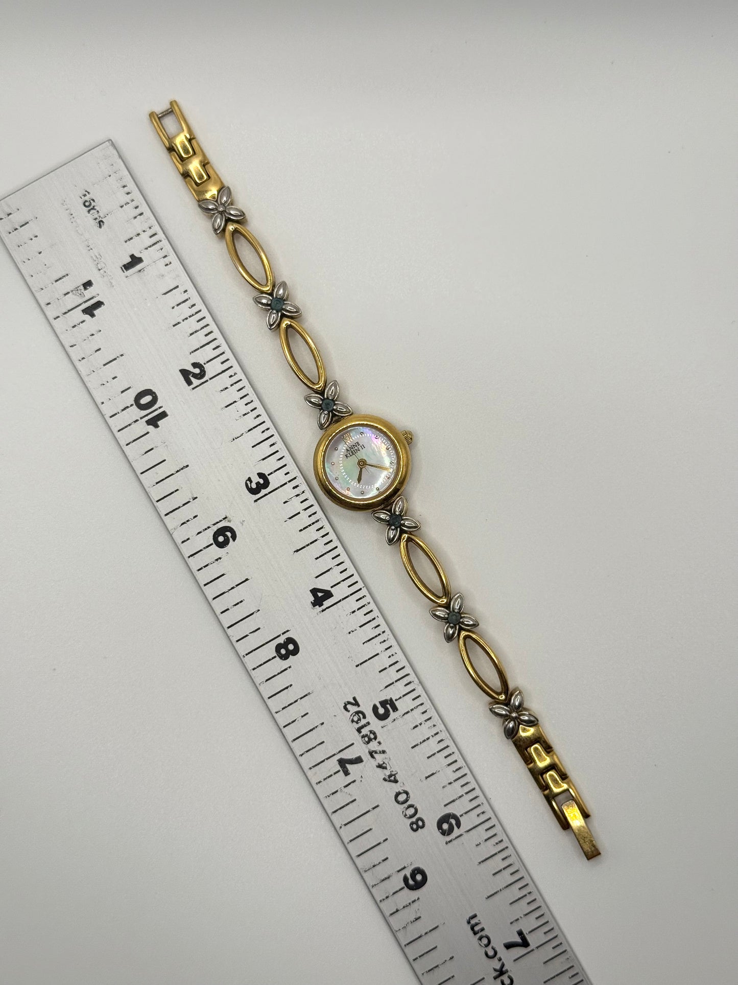 nonworking gold tone blue gemstone watch