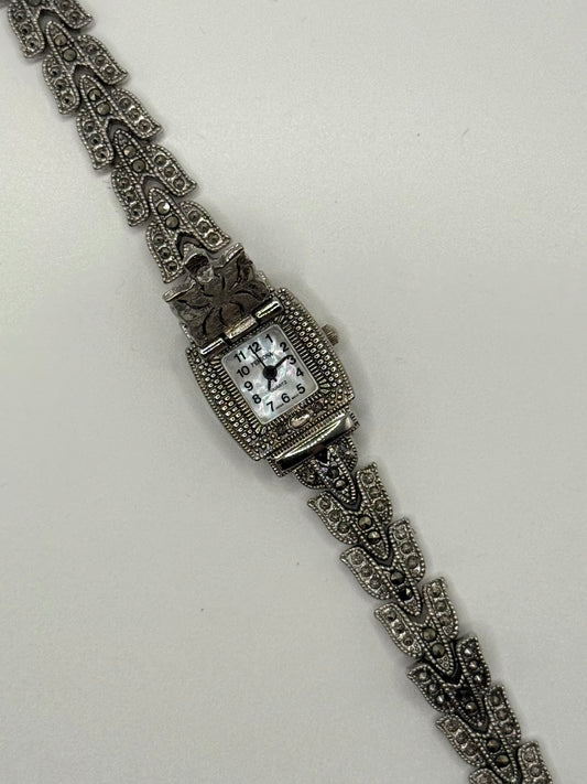 working silver tone marcasite peek a boo watch