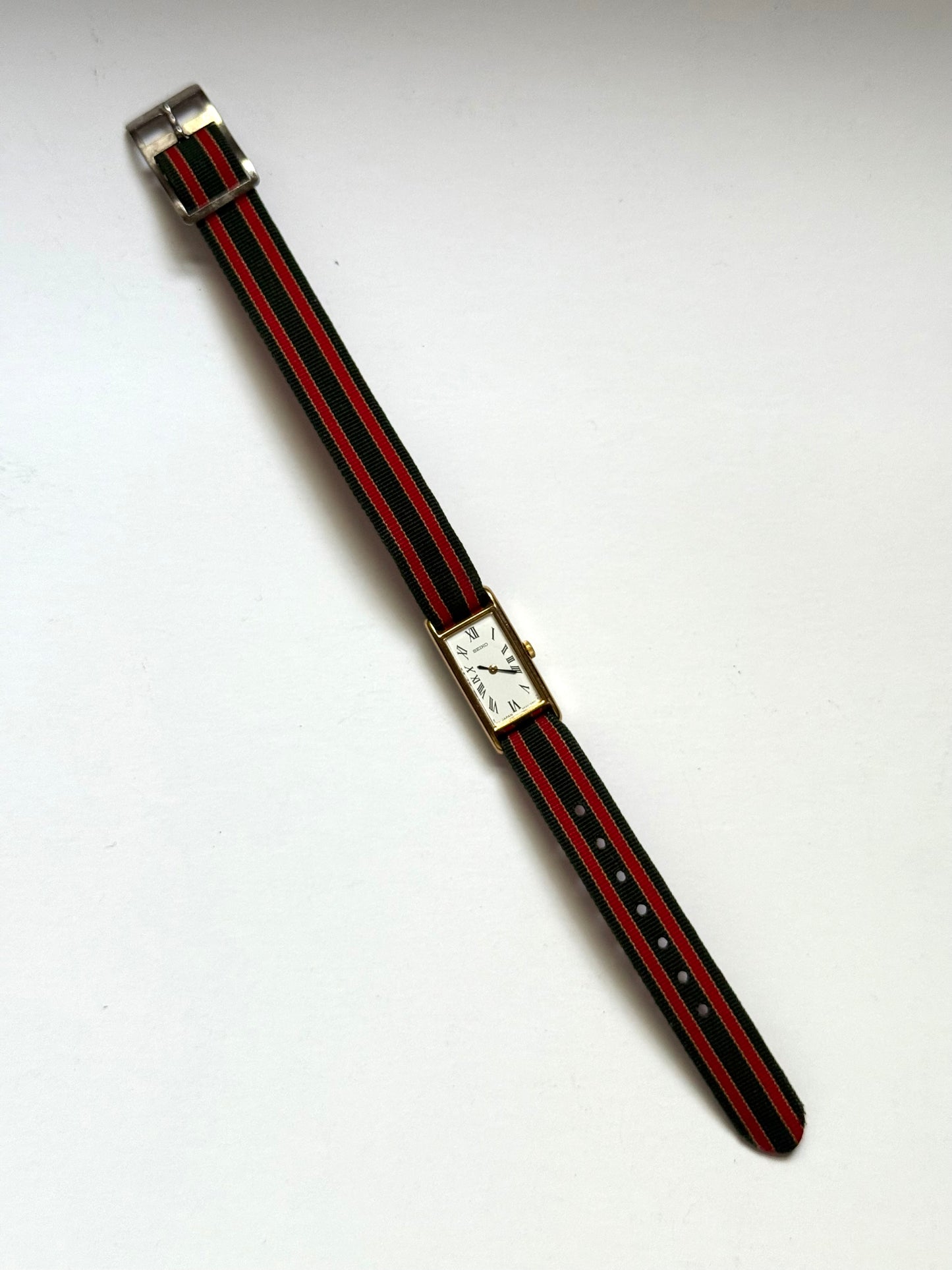 working gold tone red and green strap seiko watch