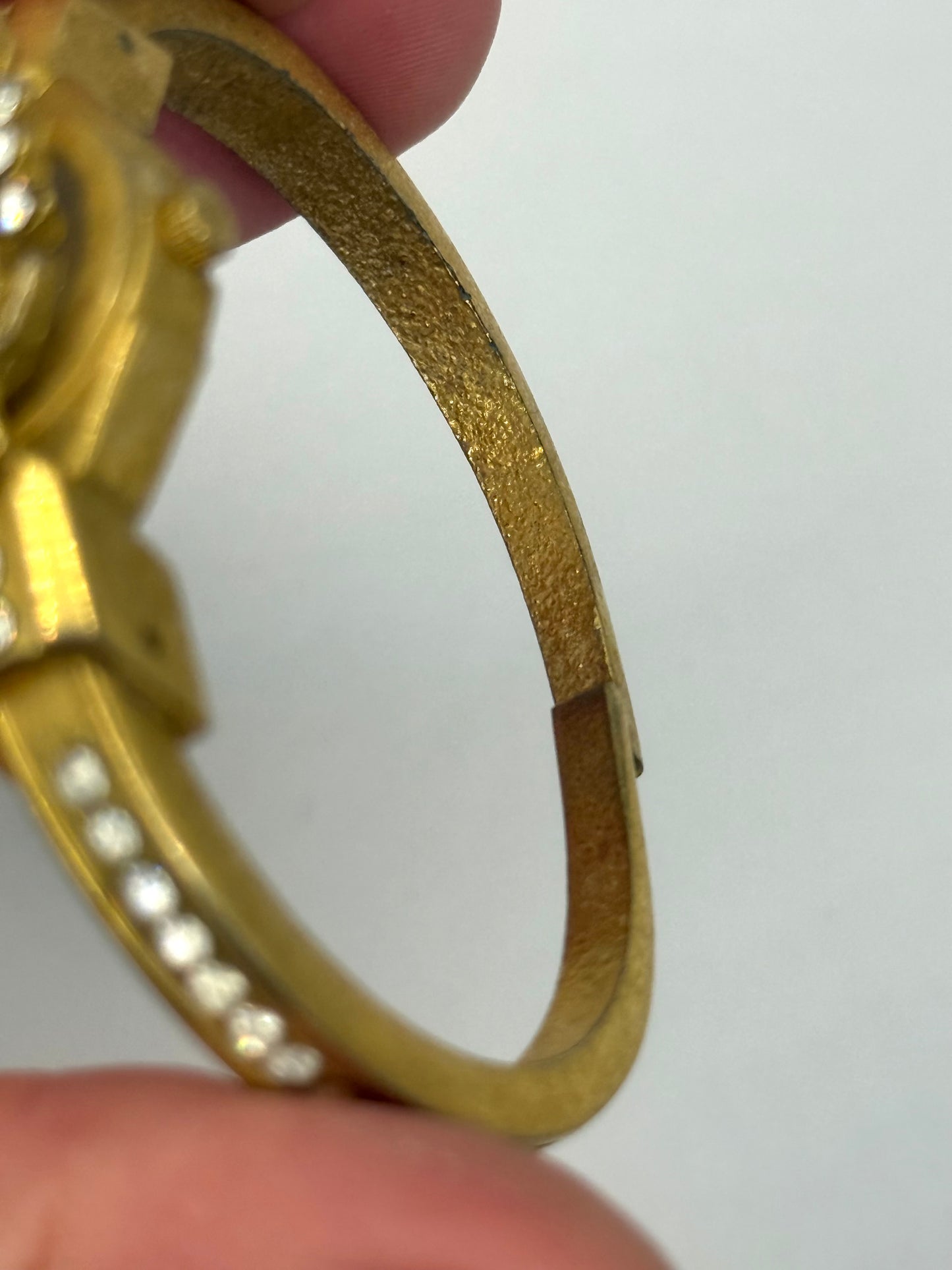 working gold tone peek a boo watch