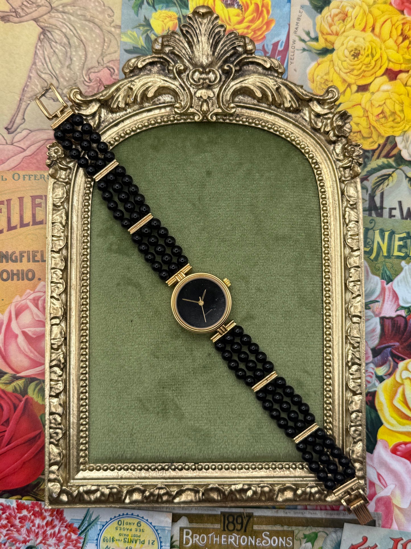 Nonworking Gold Tone Black Stone Watch