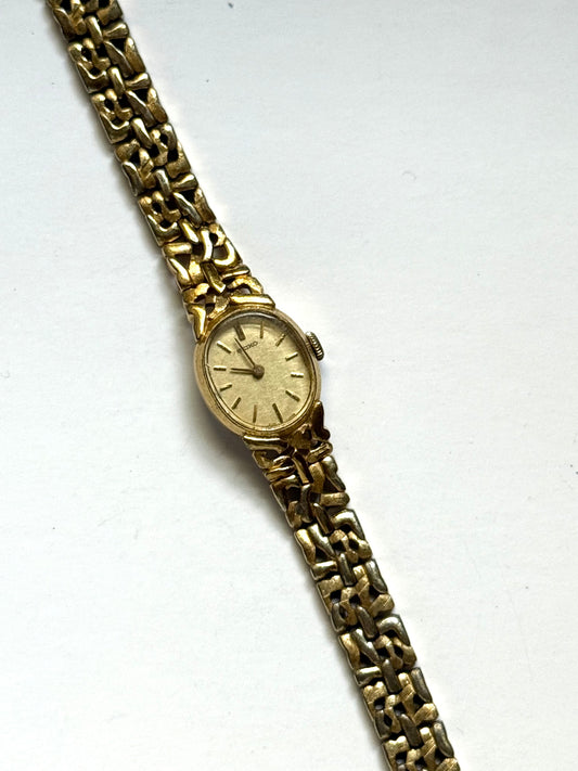working gold tone wind up seiko watch