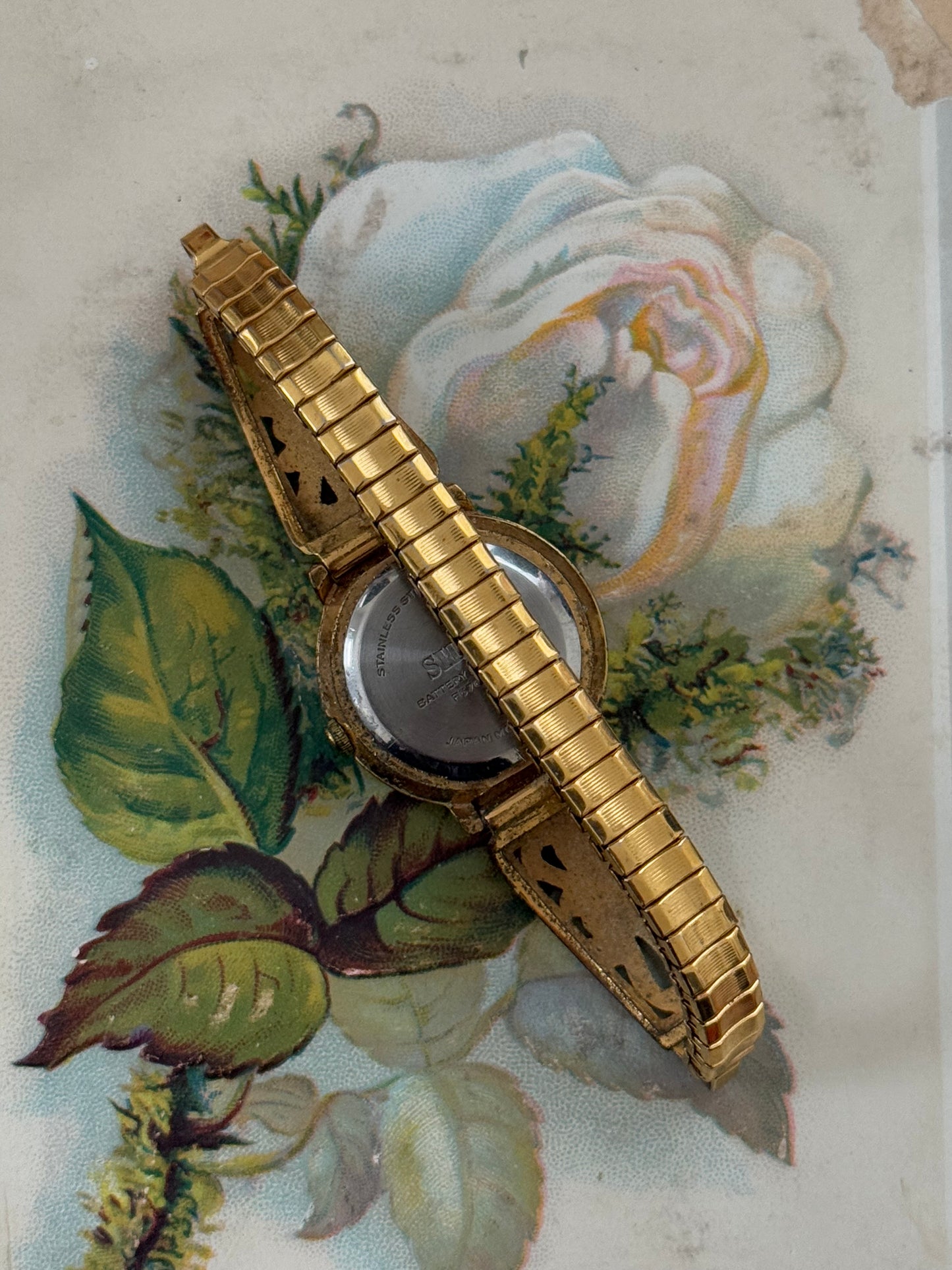 avon gold tone vintage cherub watch