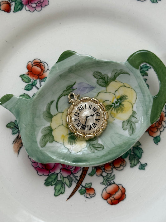 gold tone mother of pearl clock pendant