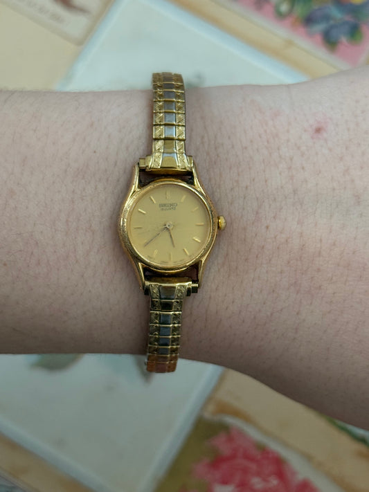 seiko vintage gold tone stretch band watch