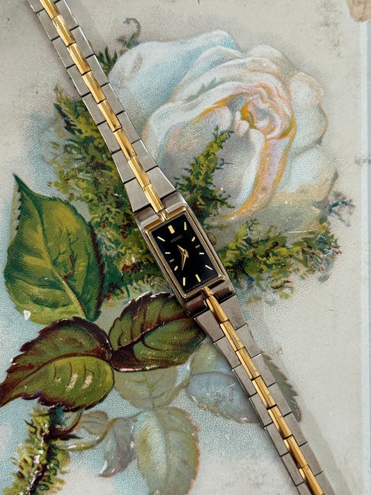 working two tone black dial seiko watch