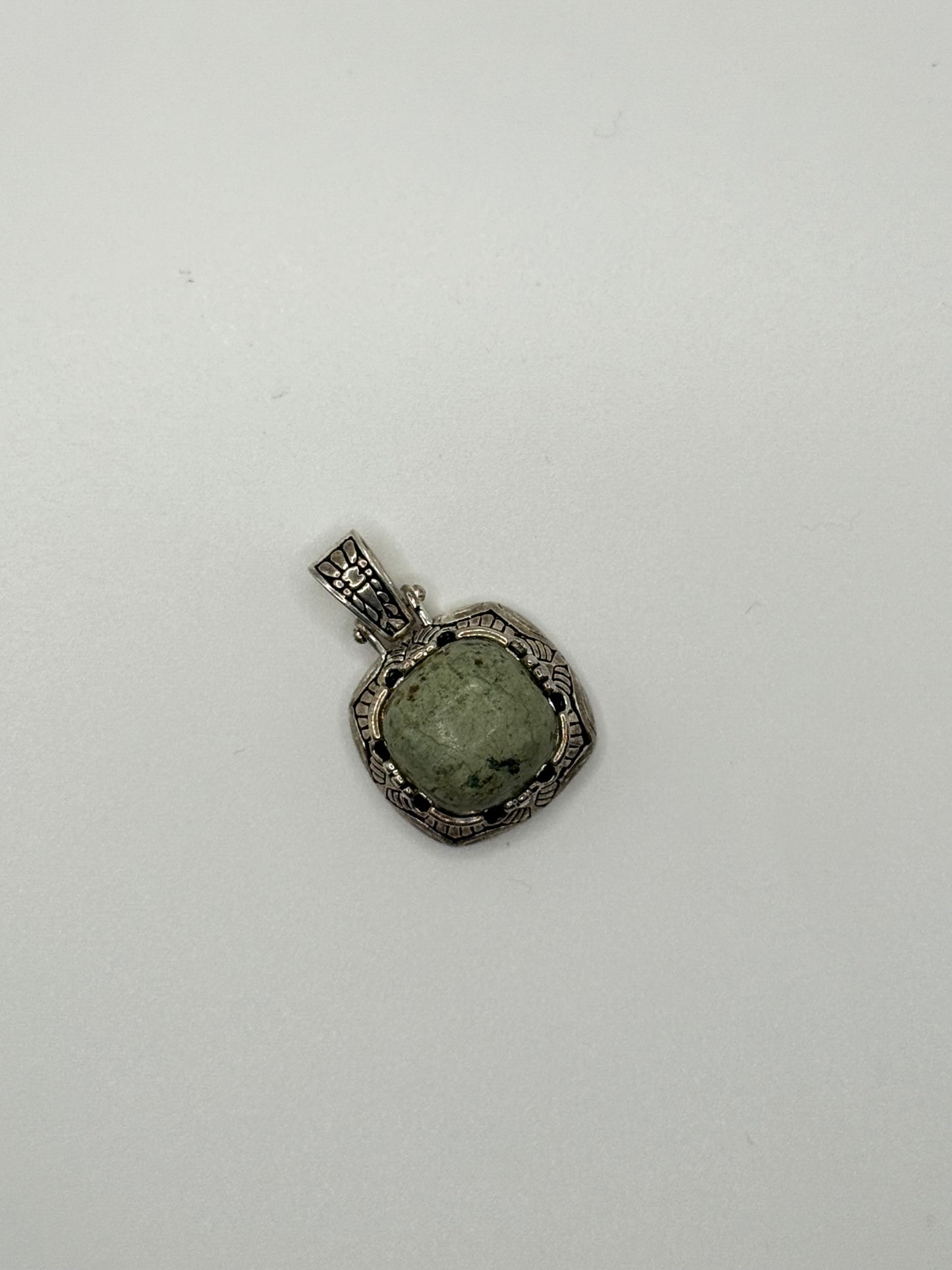 silver tone green stone pendant