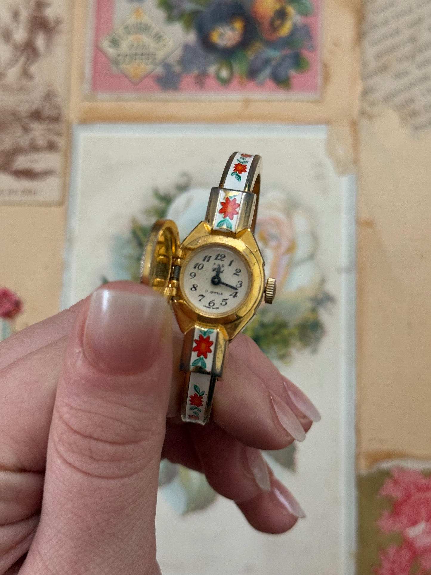 gold tone vintage floral enameled swiss made peek a boo cuff watch