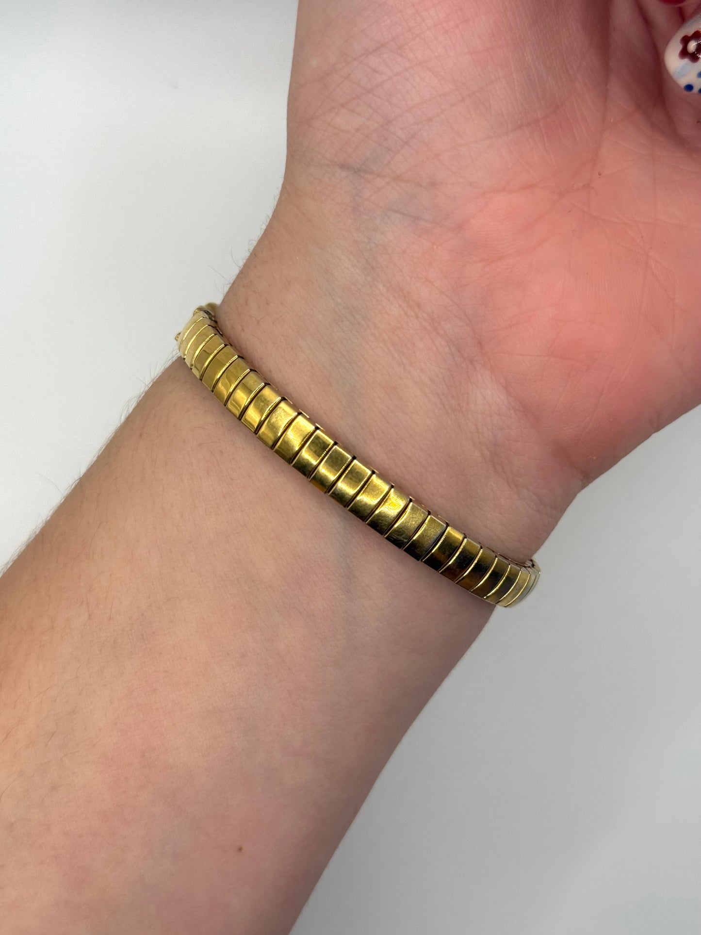 working gold tone pearl watch