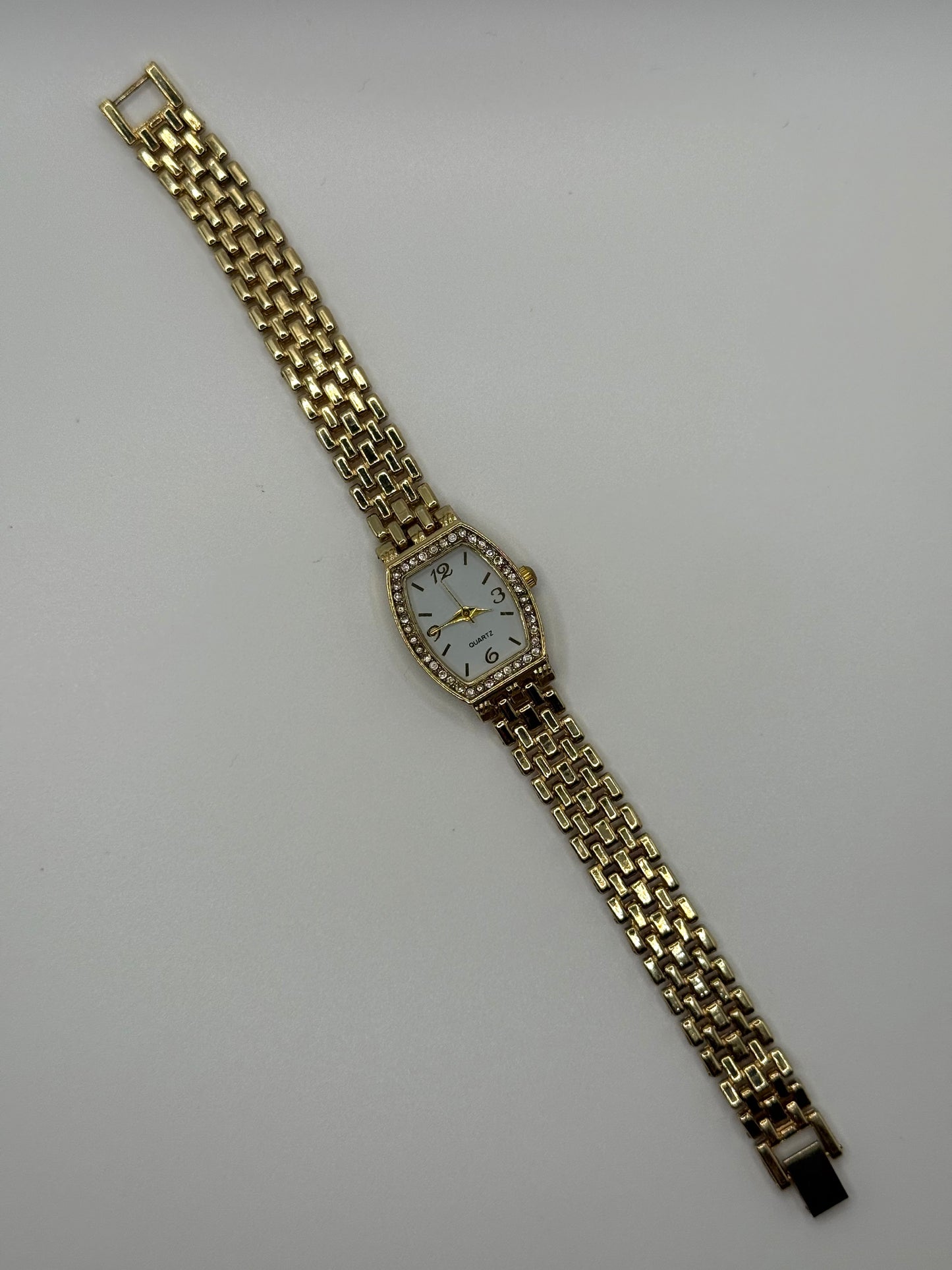 working gold tone watch