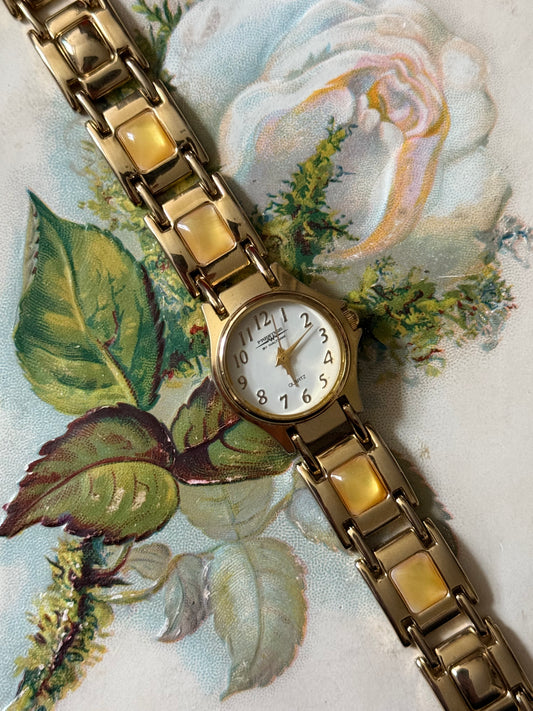 working gold tone gemstone watch