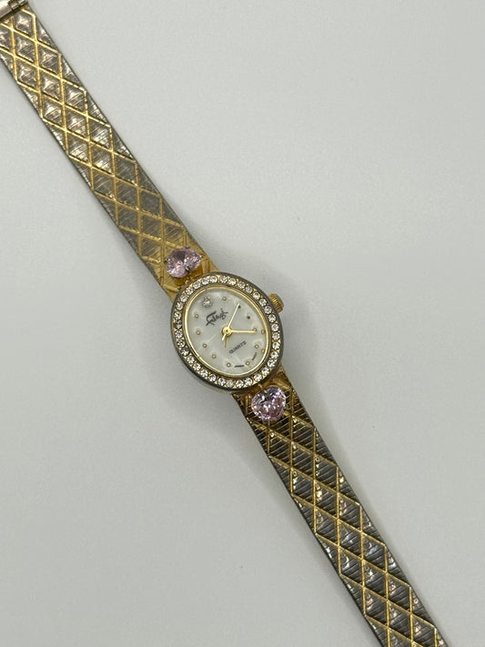 working gold tone pink gemstone watch