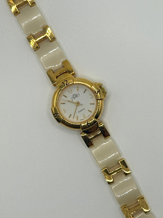 working gold tone panel watch