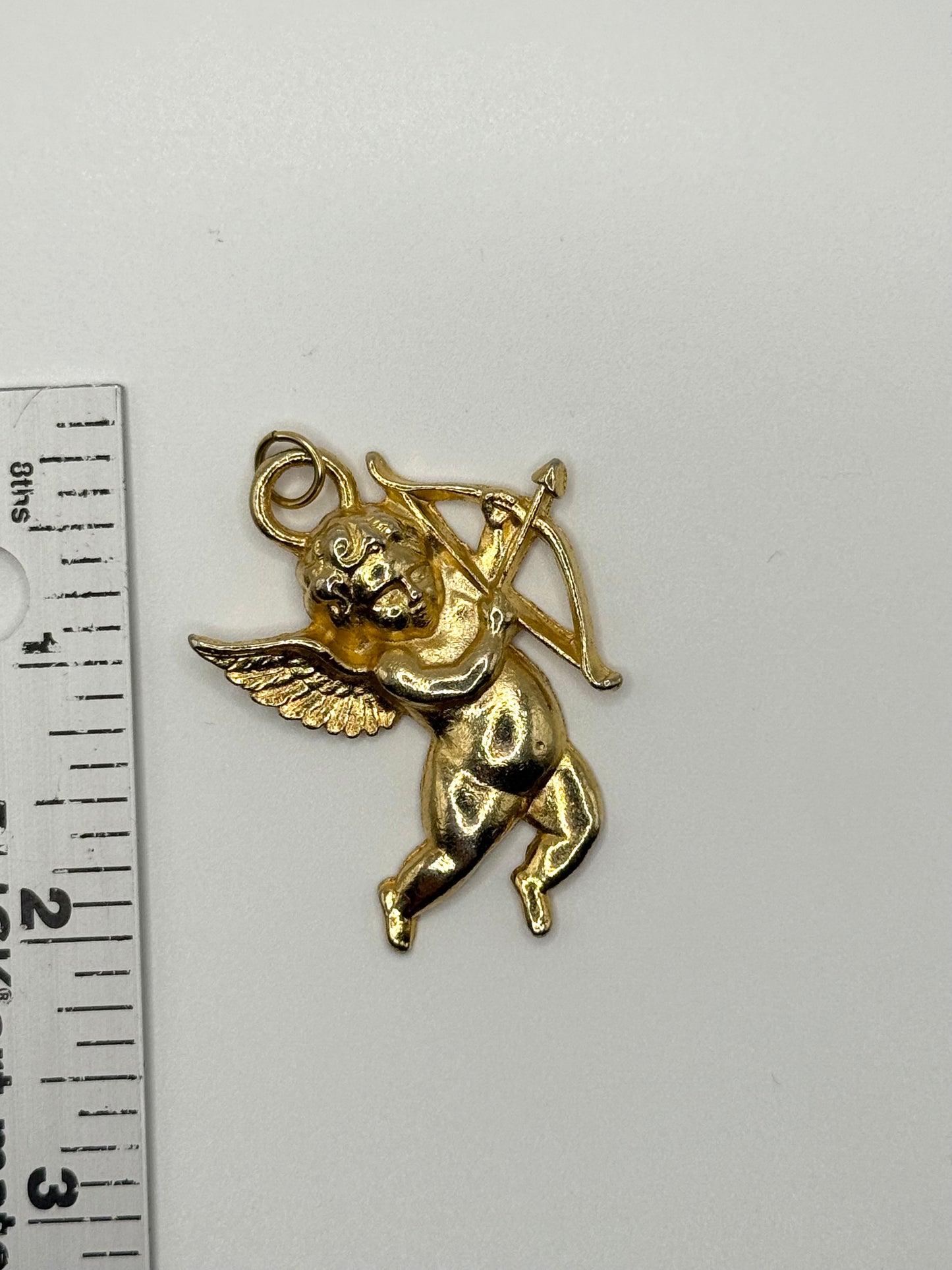 gold tone large cherub pendant