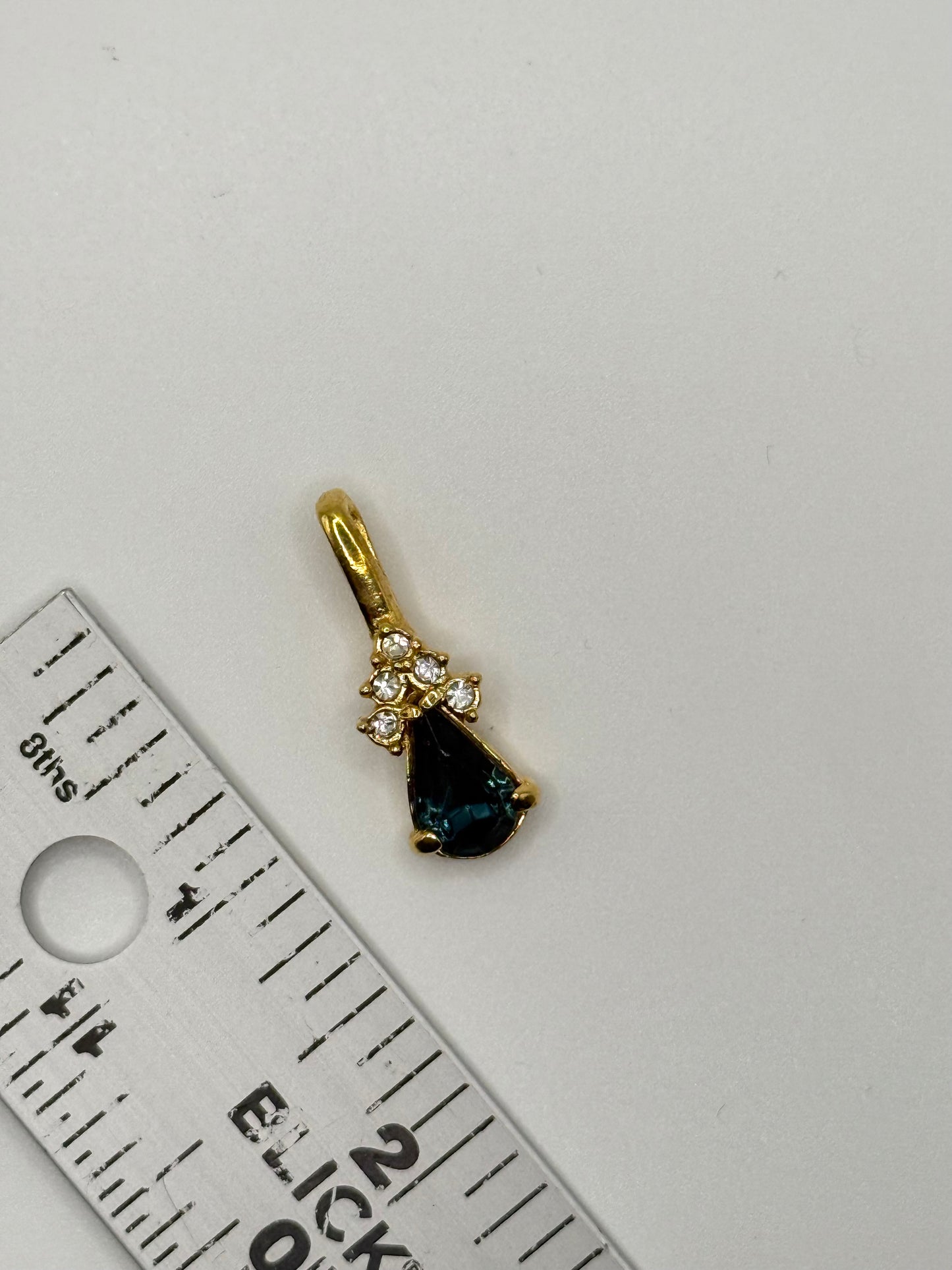 gold tone blue gemstone style pendant