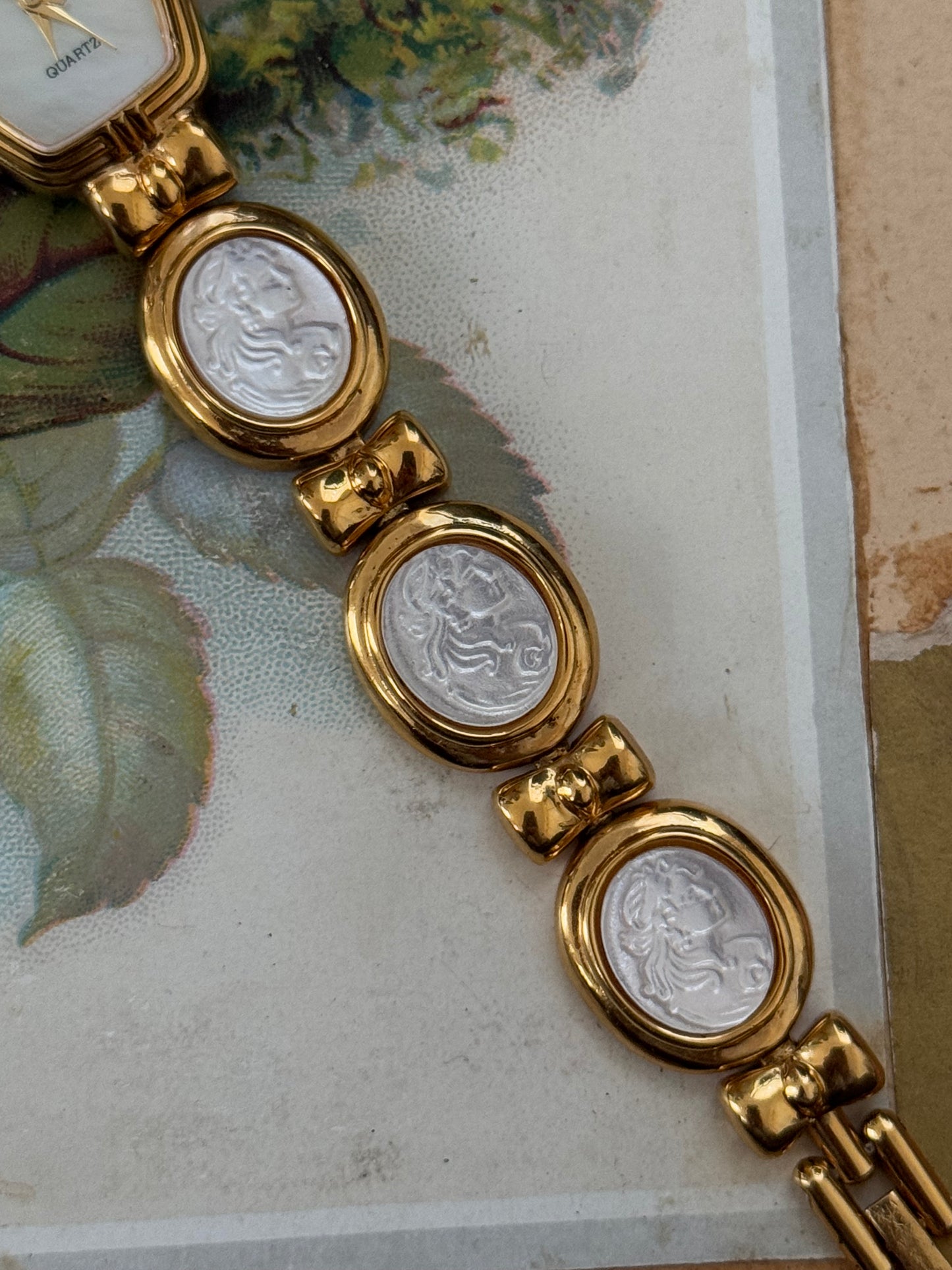 gold tone vintage mother of pearl cameo band watch