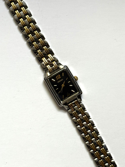 working two tone black dial seiko watch