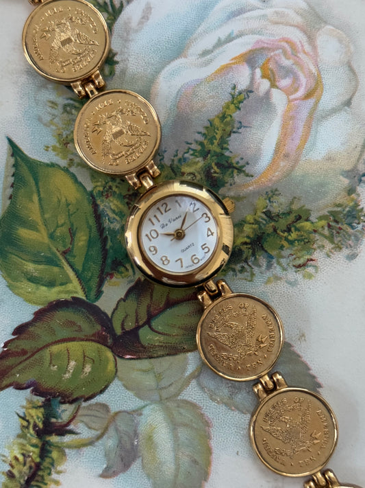 gold tone vintage coin band watch