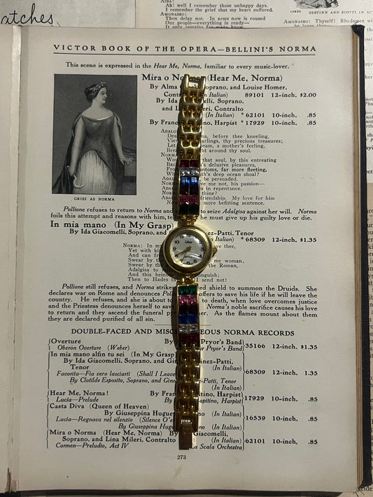 collezier gold tone rainbow rhinestone vintage watch